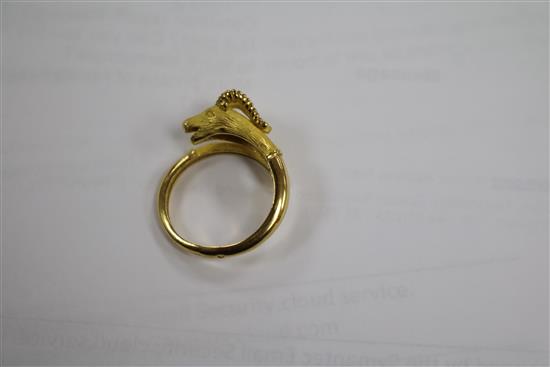 A textured yellow metal rams head ring, size P/Q